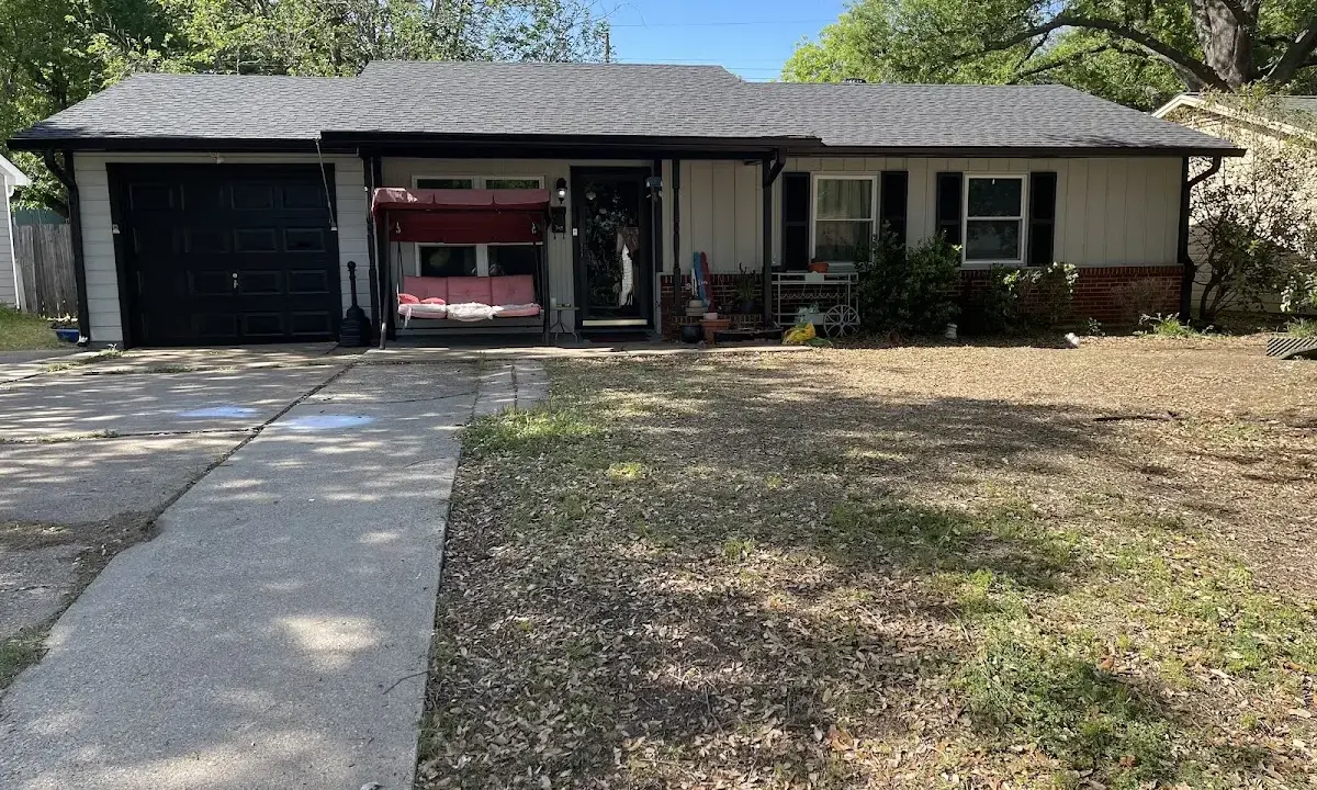 Asphalt Shingle Roof Repair crew at work on a residential roof in Lochbuie
